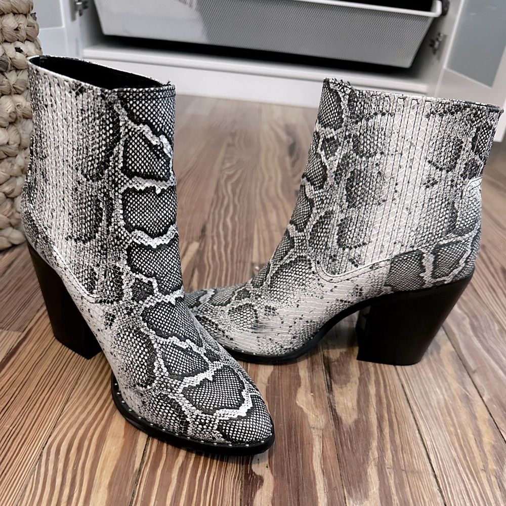 Faux snakeskin booties with Low heel.